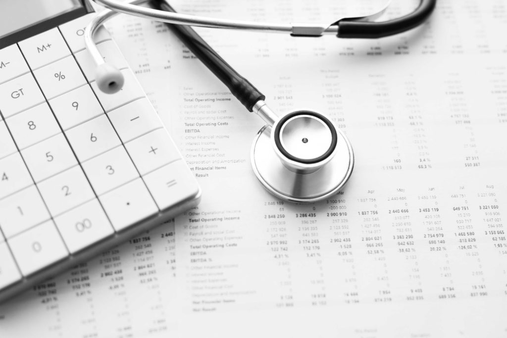 Stethoscope,And,Calculator.,Concept,Of,Health,Care,Costs,Or,Medical Bill